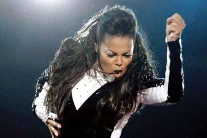 Janet Jackson Glamour In Chic Brown Leather Dress At Christian