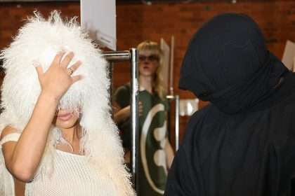 Kanye West's 'wife' Wears Giant White Wig, Swimsuit And Trademark