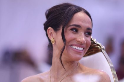 Meghan Markle Wears A Sleeveless Tan Suit To A Hamptons